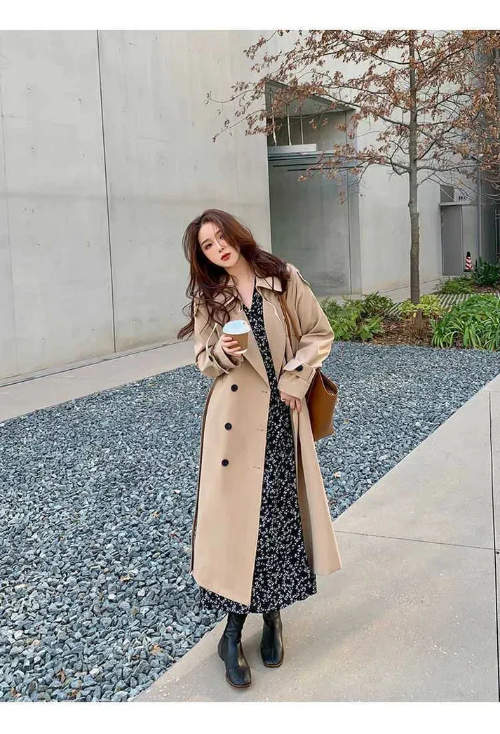 Cornelia: A long, double-breasted trench coat