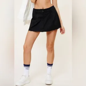 MIDI-RISE COTTON BLACK MINI SKIRT WITH RAW EDGE