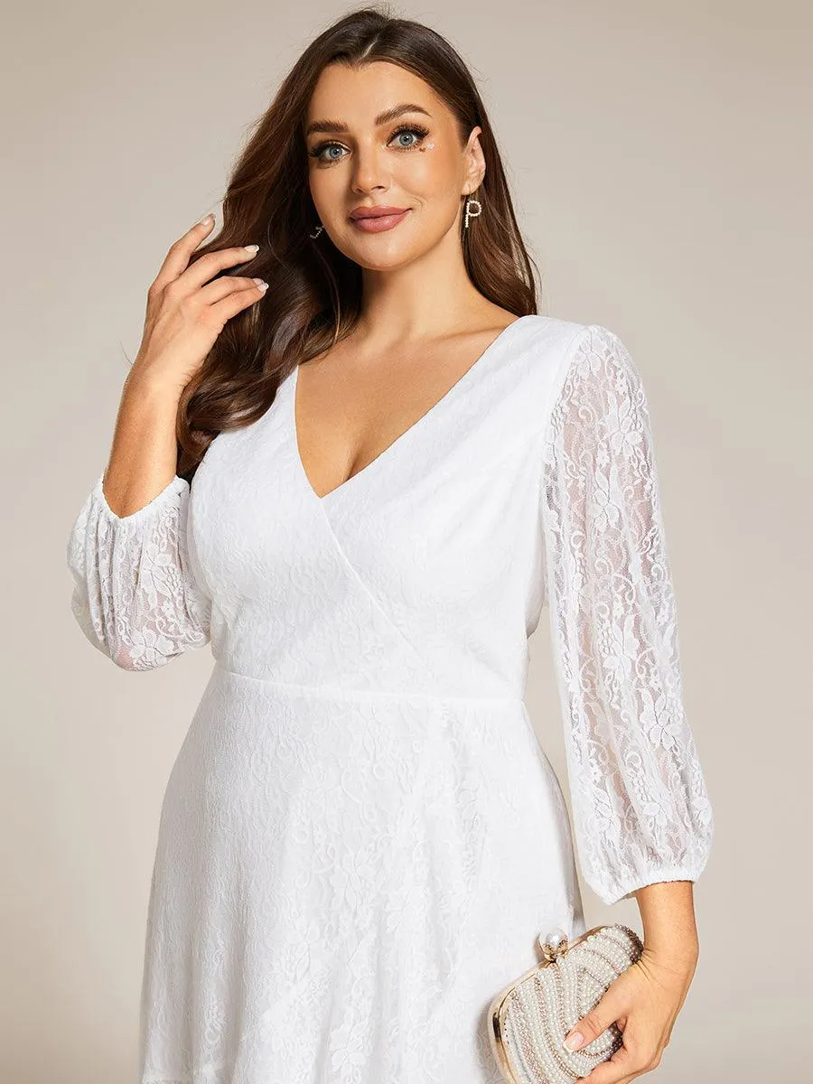 Robe de mariée mi-longue élégante en dentelle à manches longues et coupe trapèze
