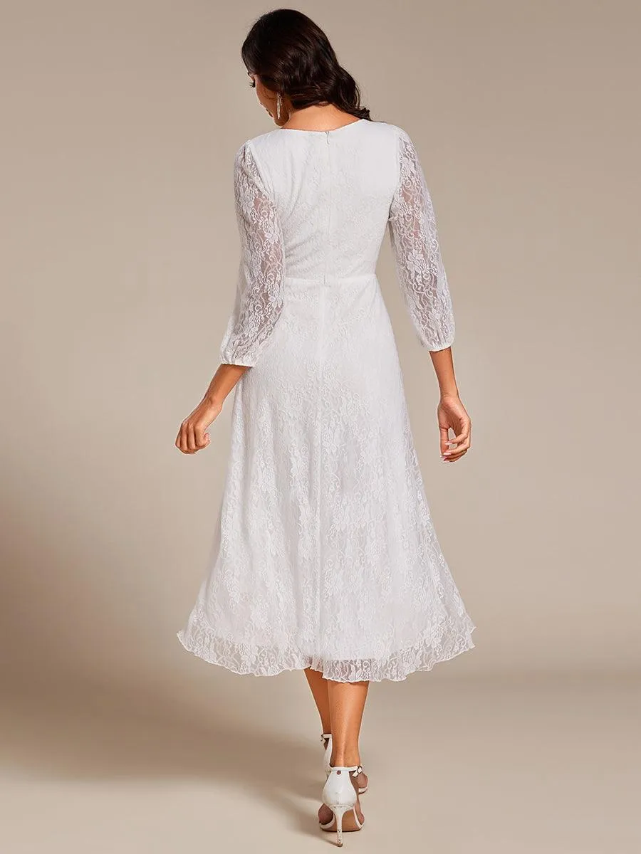 Robe de mariée mi-longue élégante en dentelle à manches longues et coupe trapèze