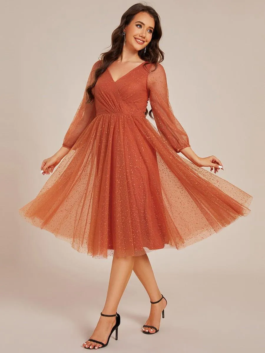 Robe de mariée mi-longue à manches longues et col en V scintillante