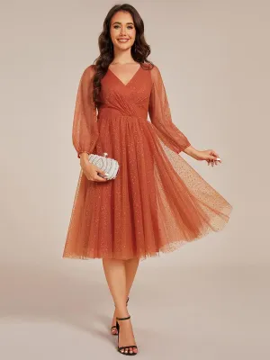 Robe de mariée mi-longue à manches longues et col en V scintillante