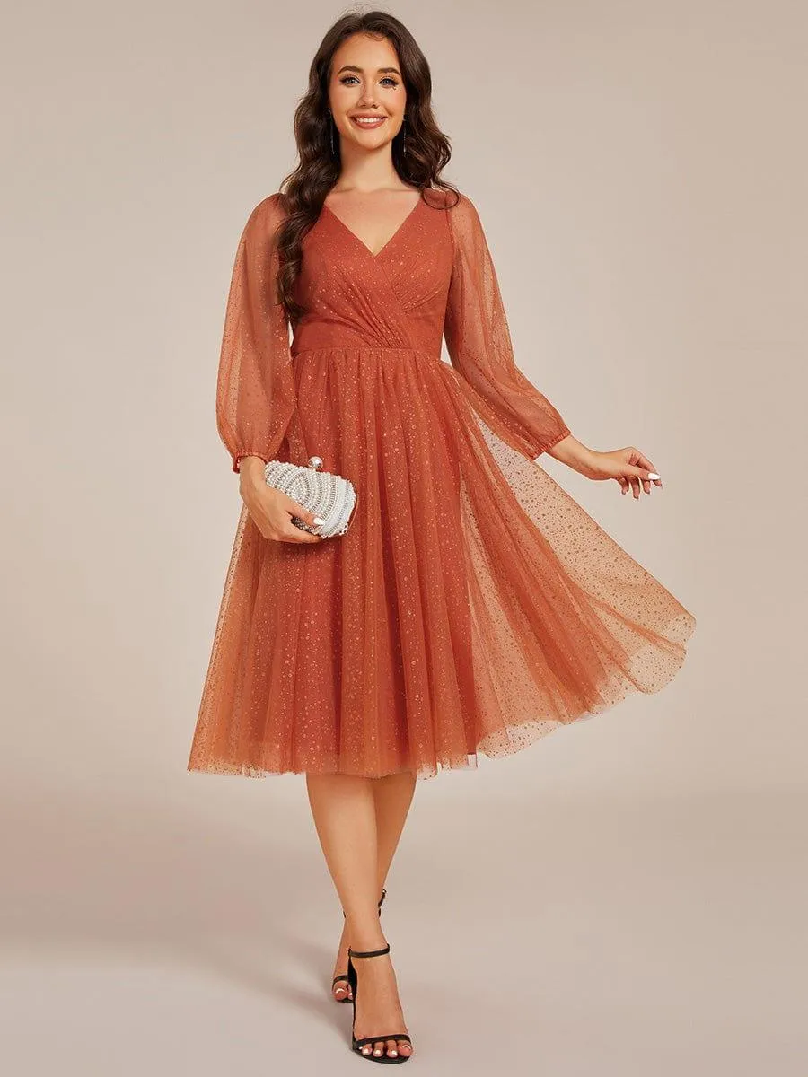 Robe de mariée mi-longue à manches longues et col en V scintillante