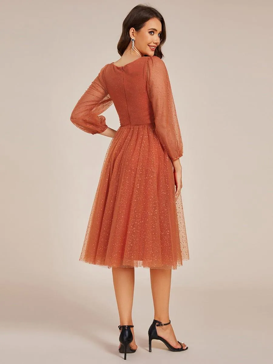 Robe de mariée mi-longue à manches longues et col en V scintillante