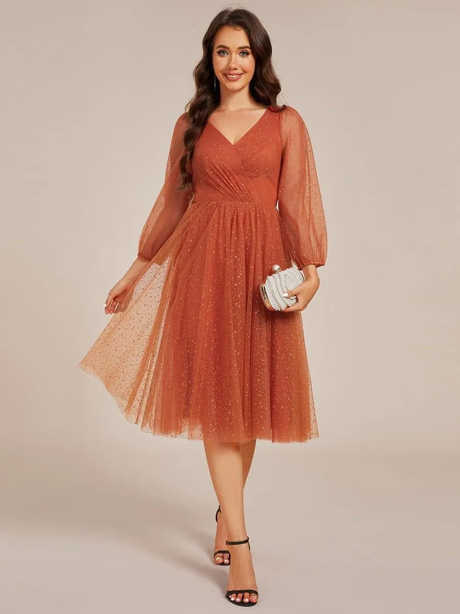 Robe de mariée mi-longue à manches longues et col en V scintillante