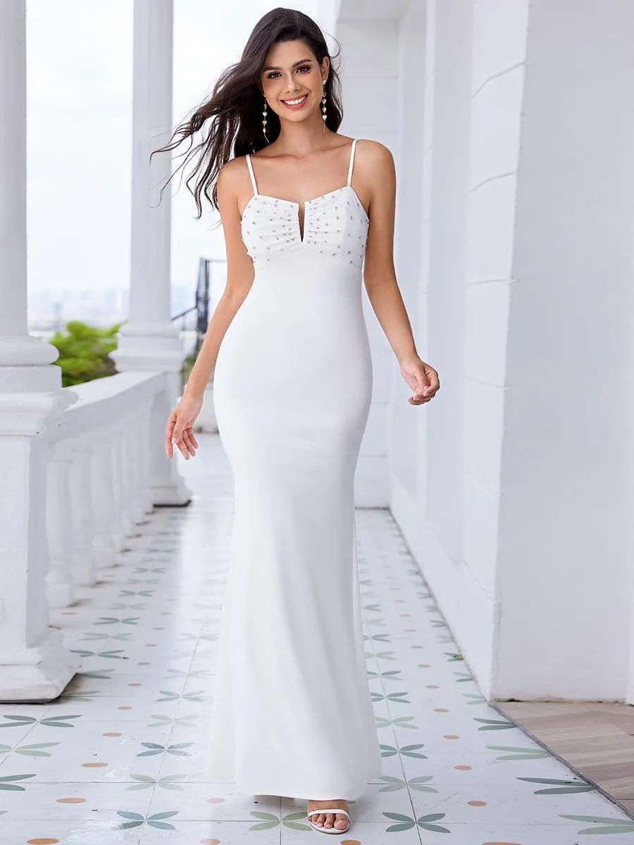 Robe de soirée élégante moulante à bretelles spaghetti et perles