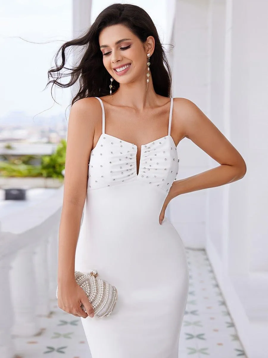 Robe de soirée élégante moulante à bretelles spaghetti et perles