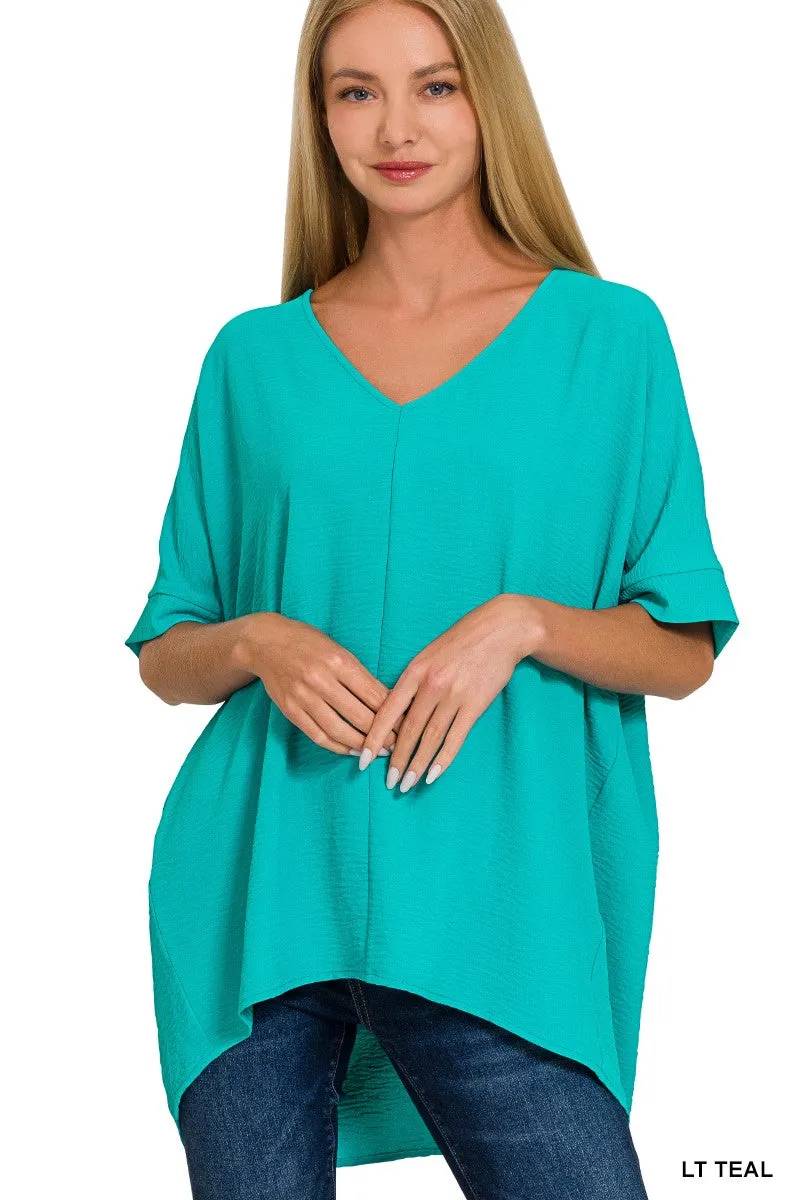 WOVEN AIRFLOW V-NECK DOLMAN SHORT SLEEVE TOP