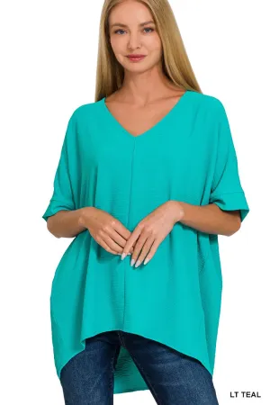 WOVEN AIRFLOW V-NECK DOLMAN SHORT SLEEVE TOP